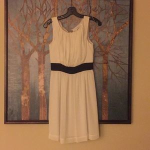Simple good-for-all-occasions white dress.